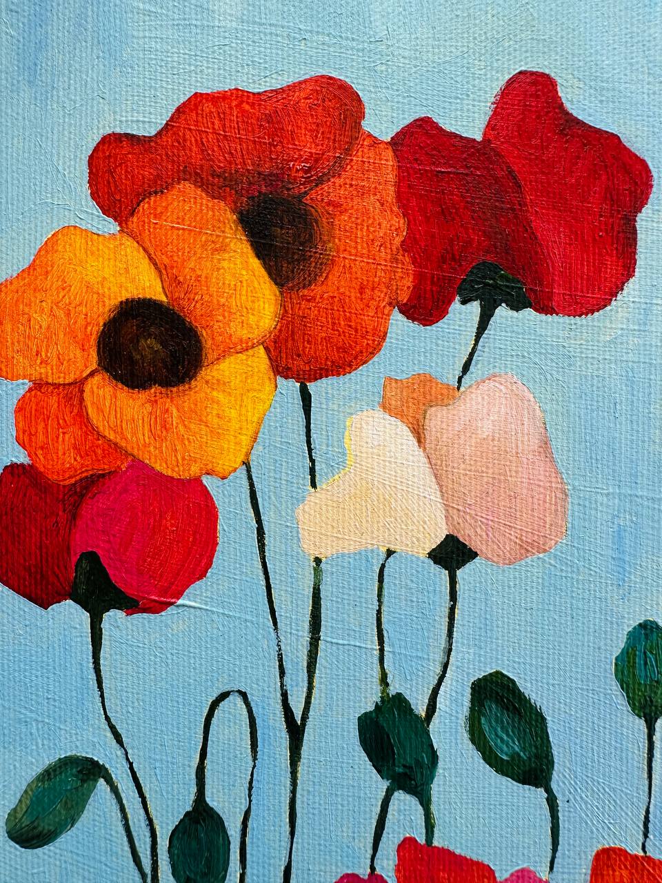 Poppies on Blue